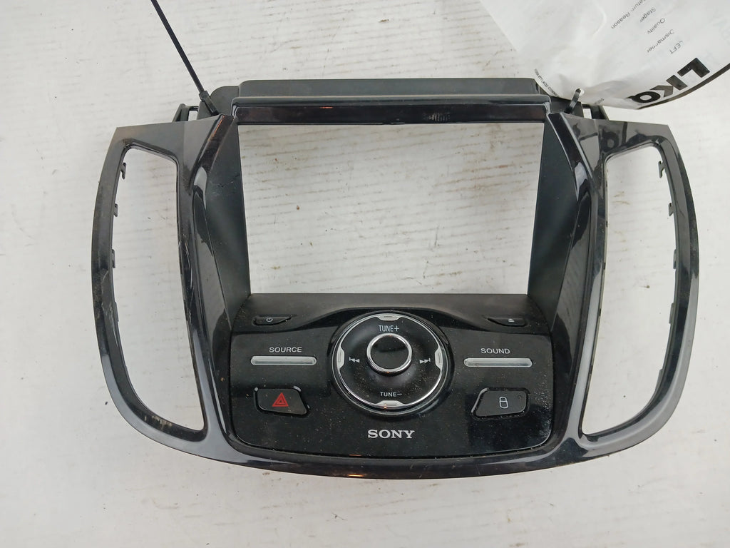 Pre-Owned 2013 Ford Escape Sony Radio Control Panel  (Good)