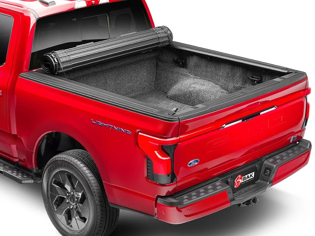 by RealTruck Revolver X4s Hard Rolling Truck Bed Tonneau Cover | 80338 | Compatible with 2021 - 2023 Ford -150 8' 2" Bed (97.6")