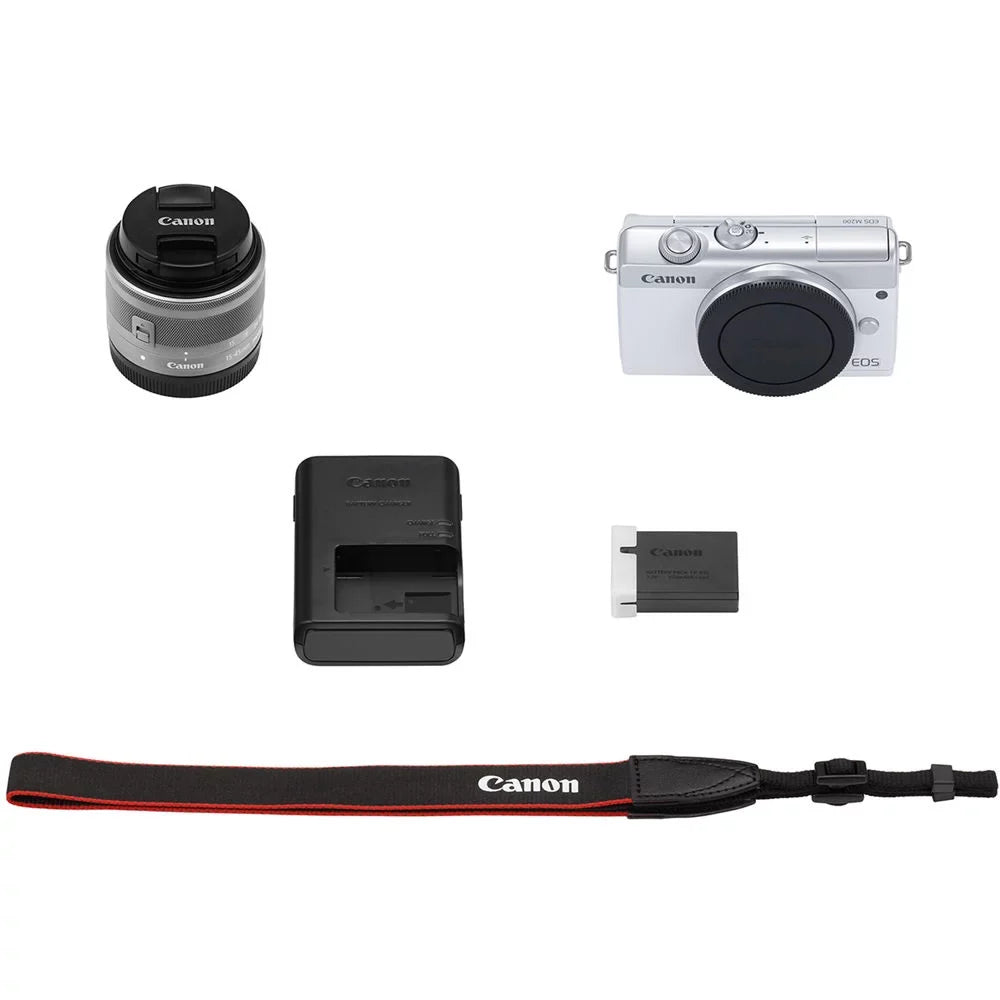 Canon   Mirrorless Camera with 15-45mm Lens (White) (3700C009) + 64GB Memory Card + Card Reader + Case + Flex Tripod + Hand Strap + Cap Keeper + Memory  Wallet + Cleaning Kit