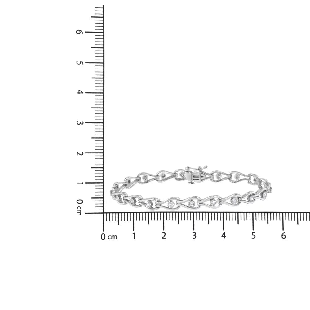.925 Sterling Silver 1/10 Cttw Miracle-Set Diamond Pear and Bezel Link Bracelet (- Color,  Clarity) - 7.25"